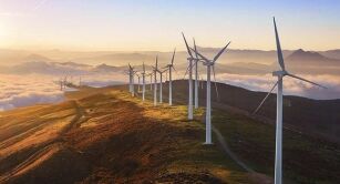 Wind turbines on a mountain during sunset